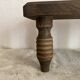 Low stool, turned wooden legs.