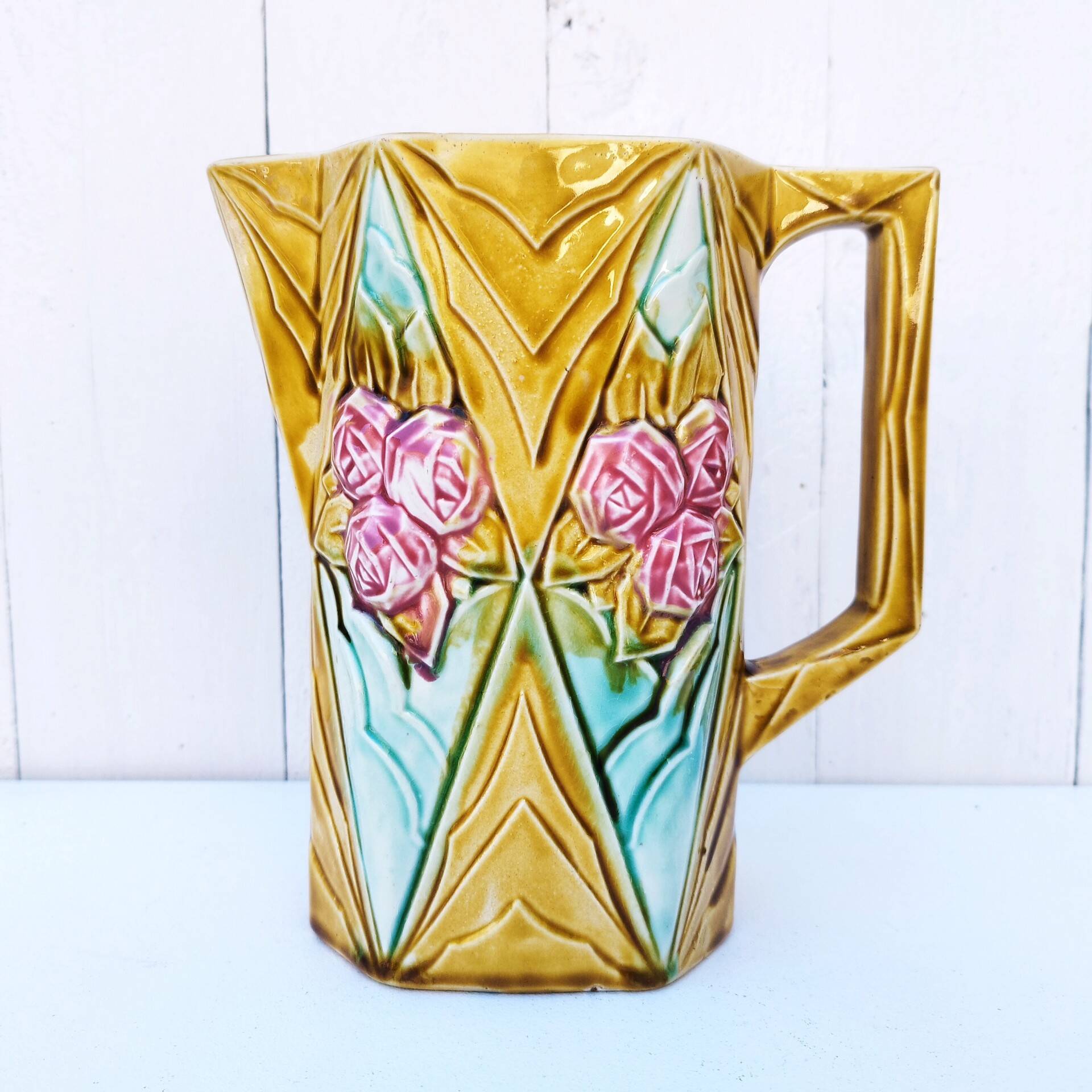 Vintage Onnaing slip rose pitcher