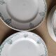 Set of 8 Moulin des Loups earthenware dinner plates, Garlands