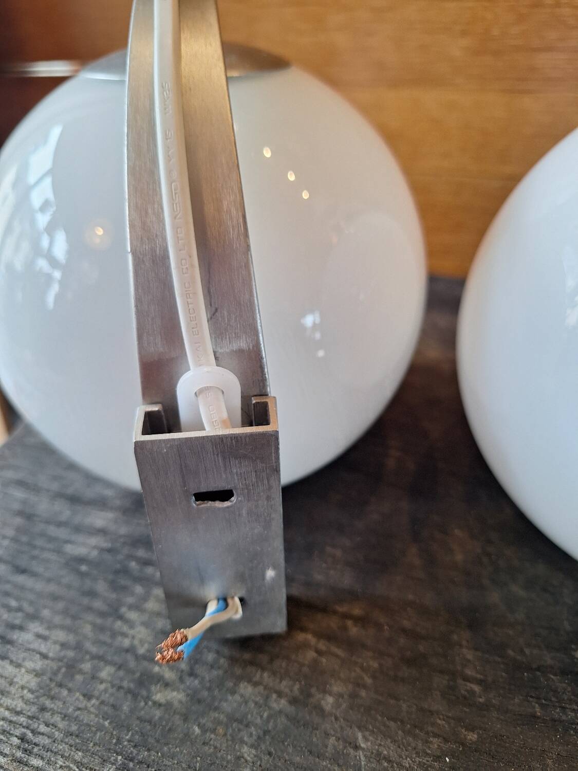 Pair of white ball wall lights