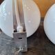 Pair of white ball wall lights