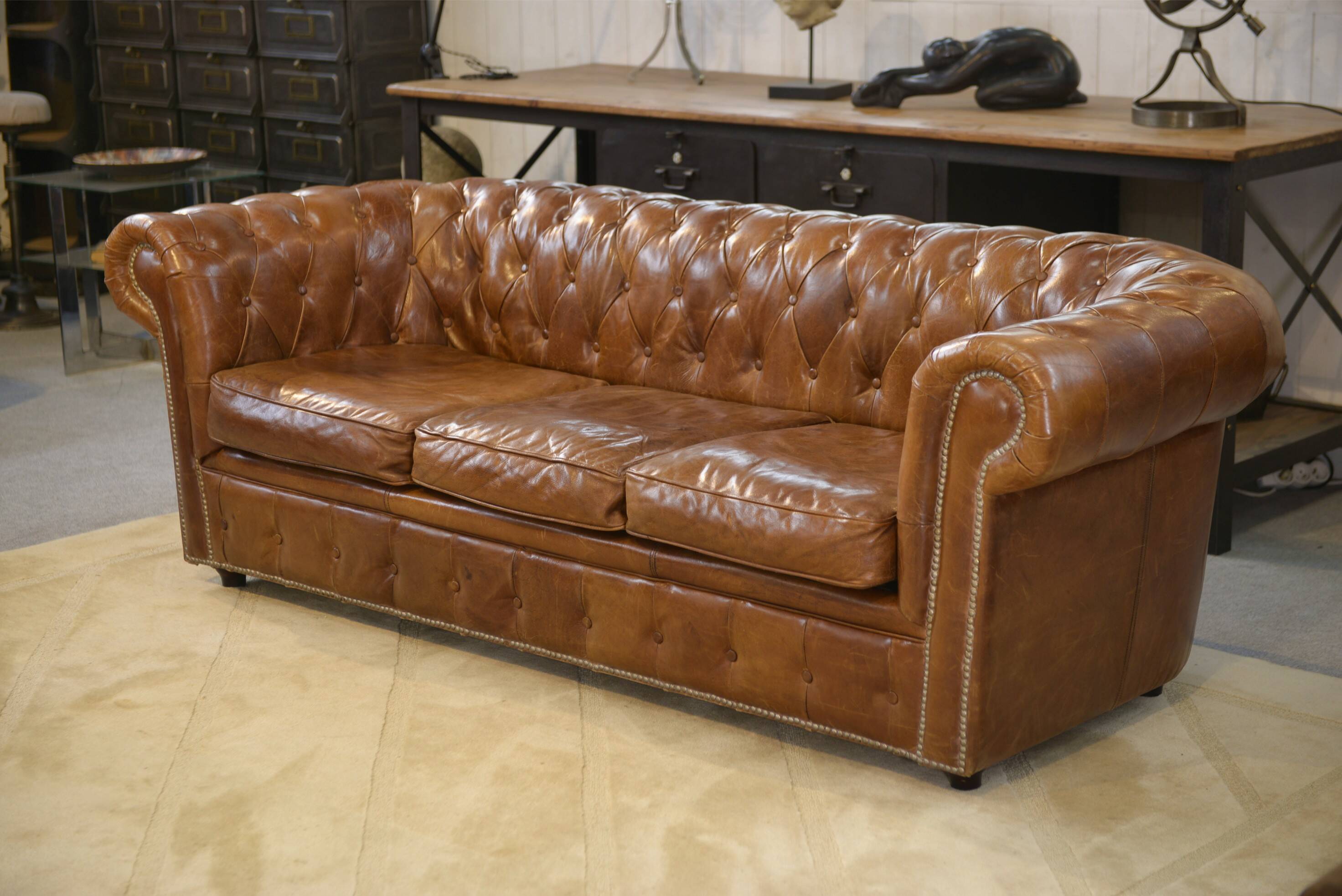 Brown leather Chesterfield sofa