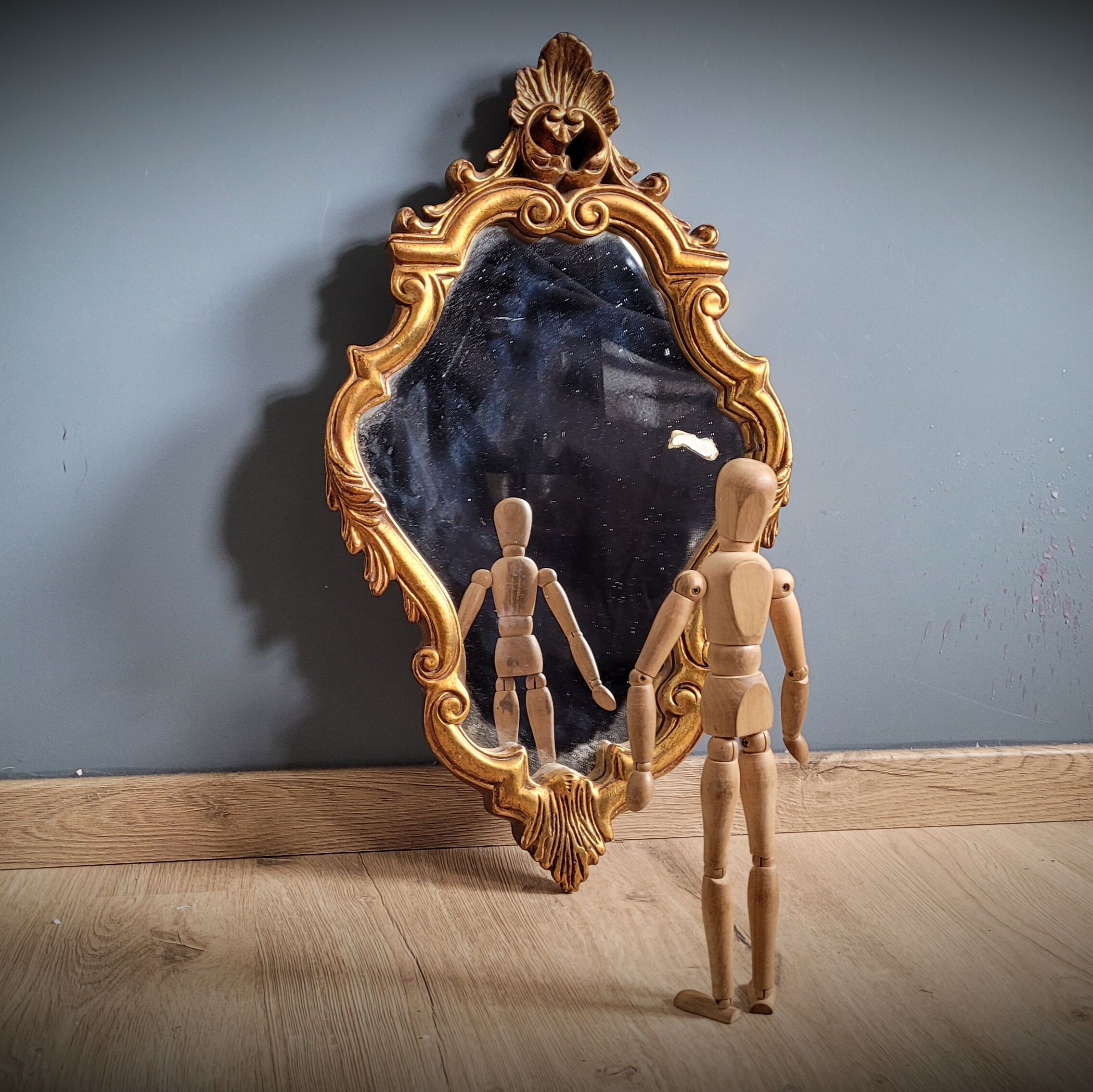 Gilded mirror worked 33x58cm