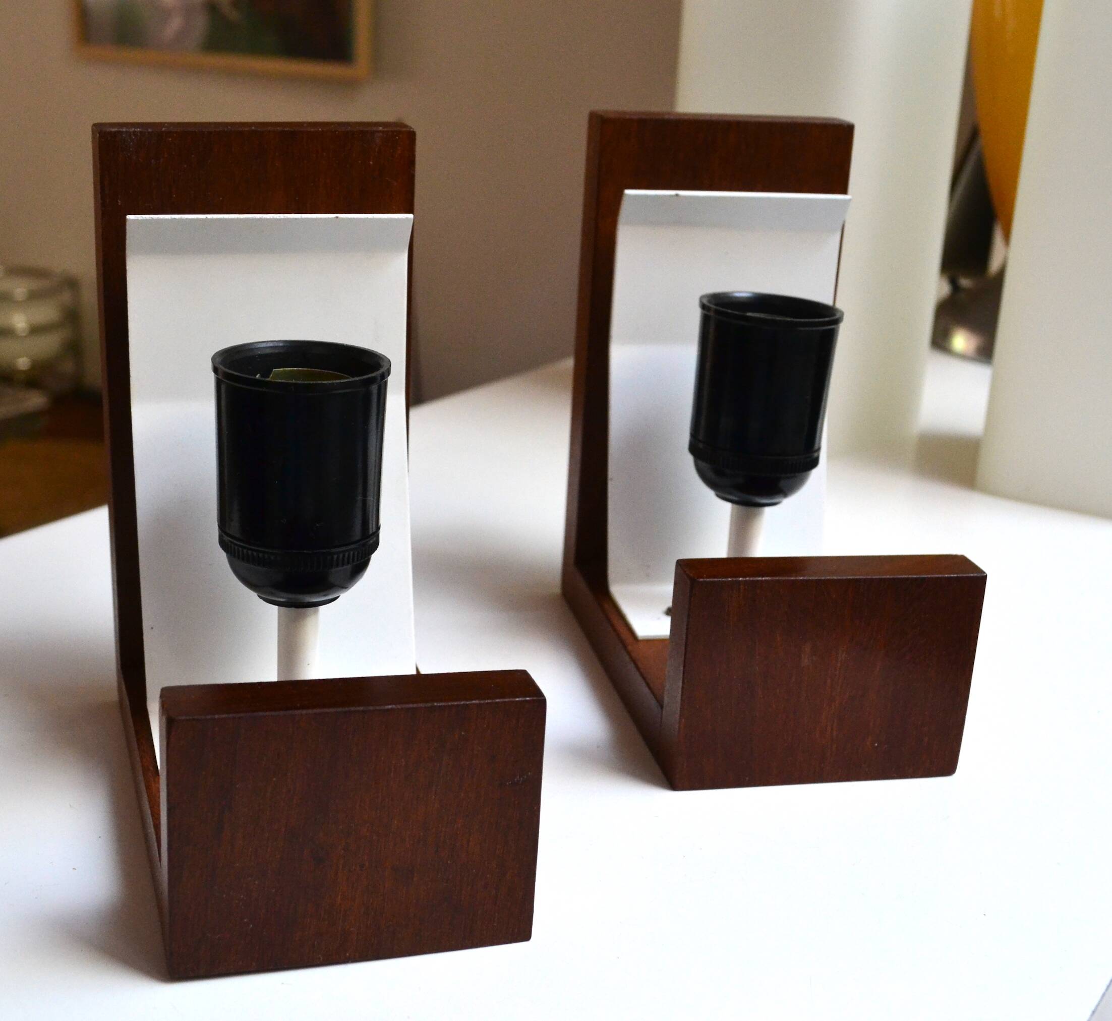 Pair of Louis Kalff wall lights, teak opalines from the 50s/60s.
