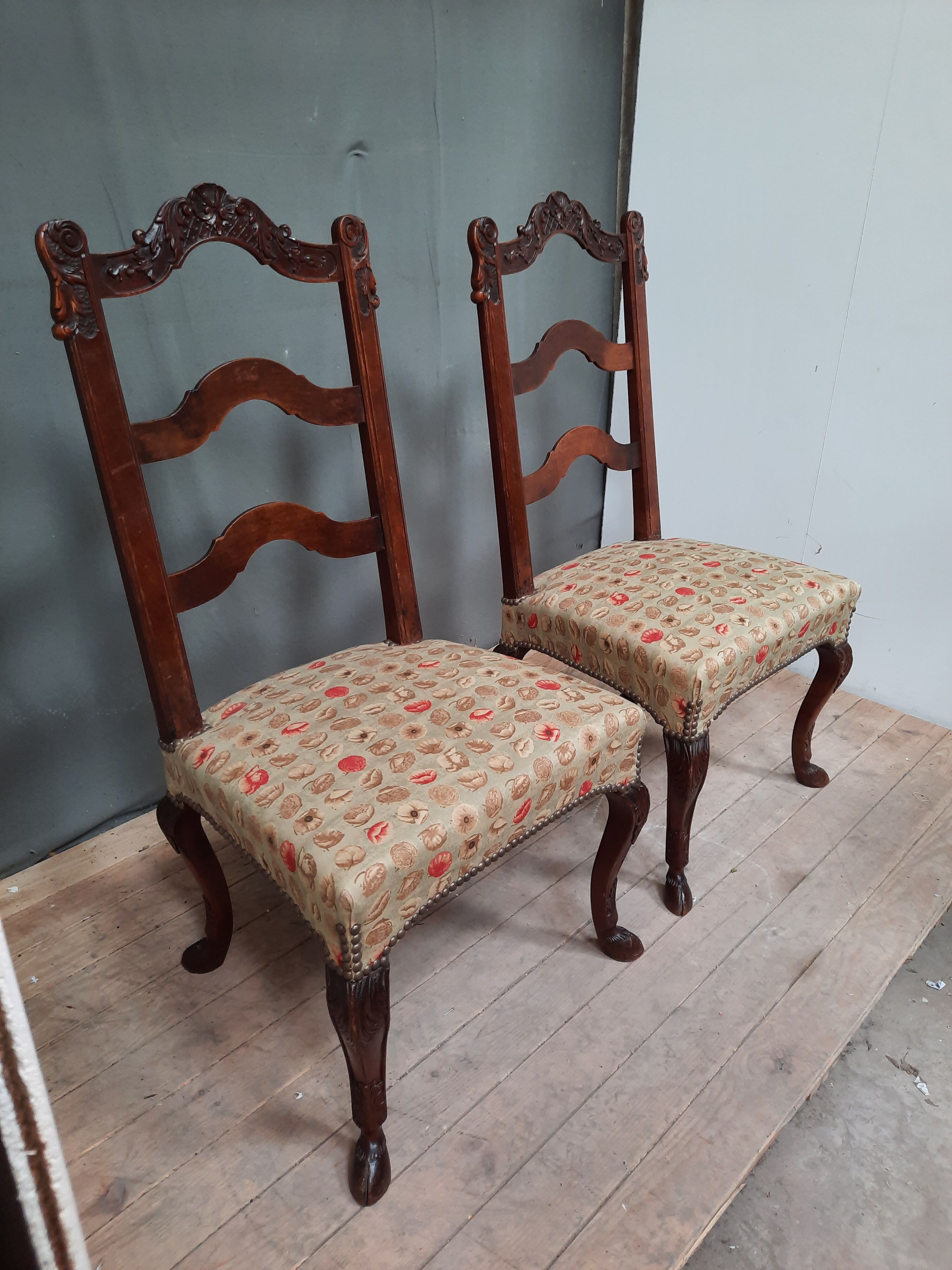 Pair of old chairs feet hoof