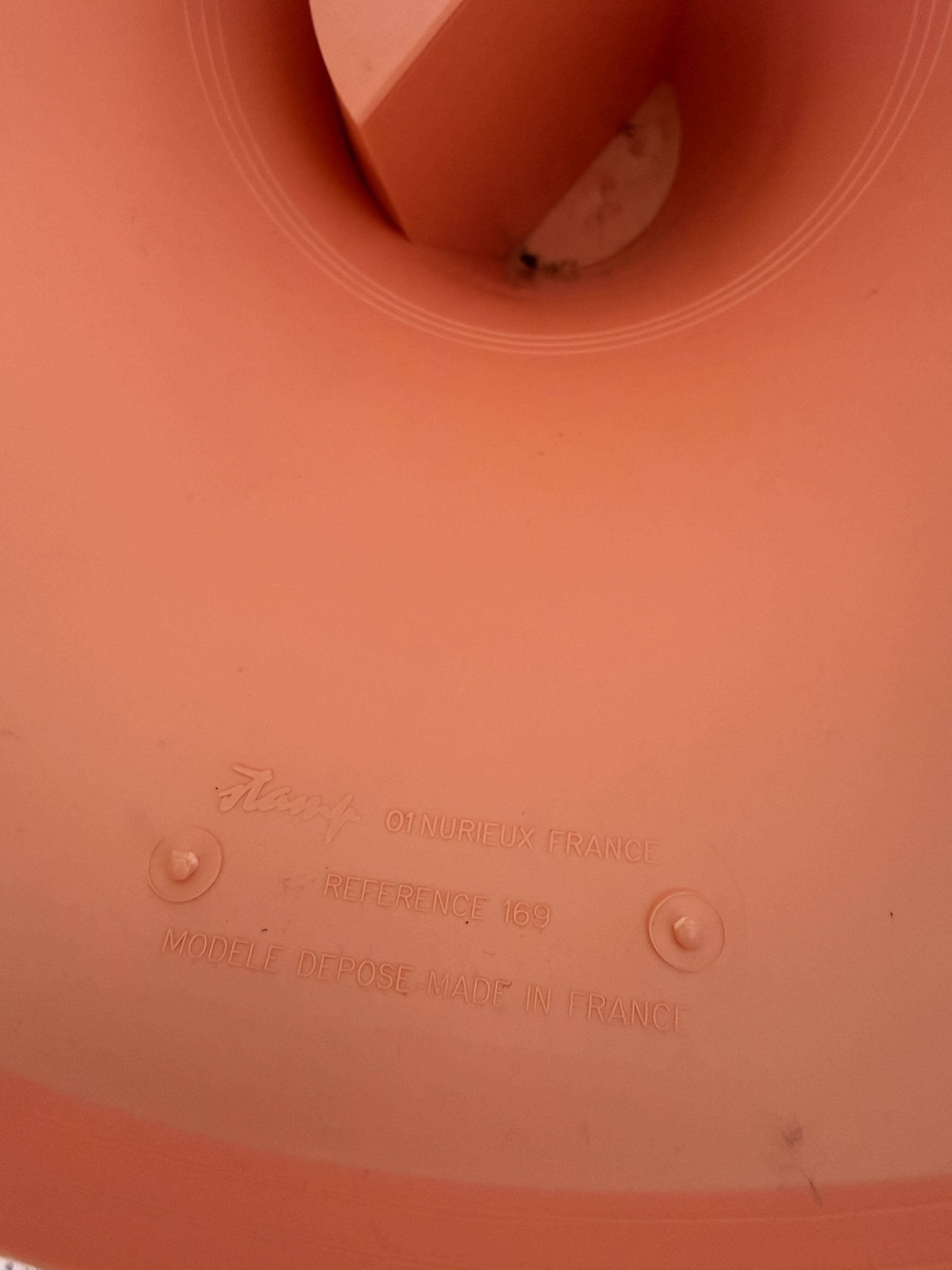 Tam Tam Stamp stool Made in France with a woven rattan-style seat.