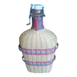 Glass and wicker bottle