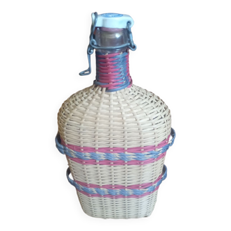 Glass and wicker bottle