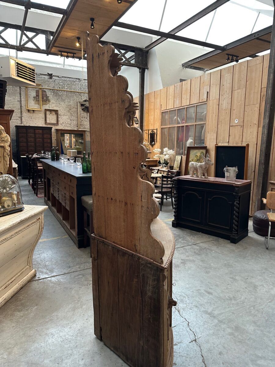 Corner cabinet in oak, late 19th century.