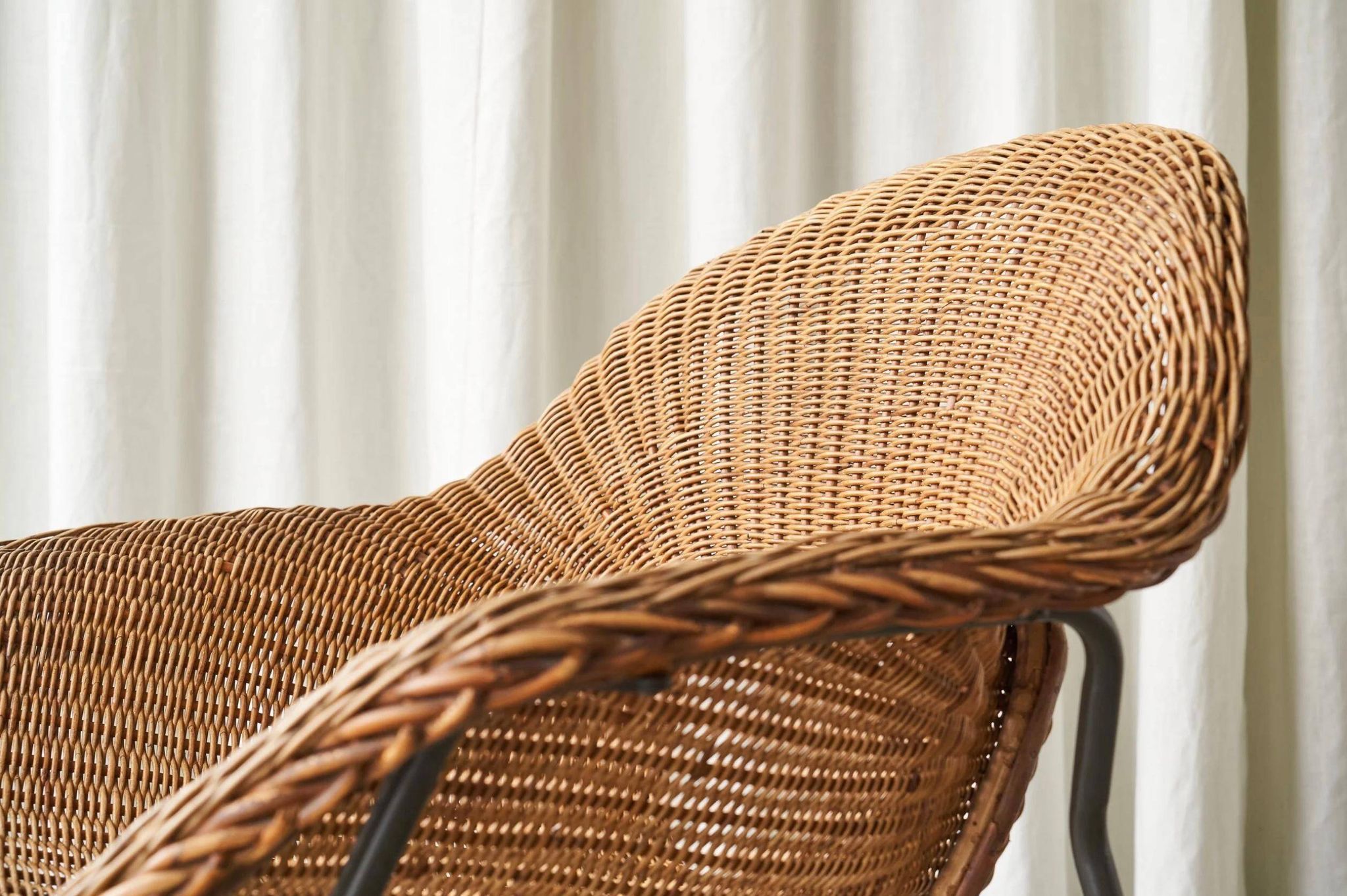 Sculptural lounge chair in rattan and metal, 1960s