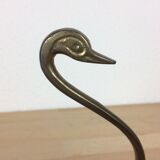 Empty golden brass swan pocket