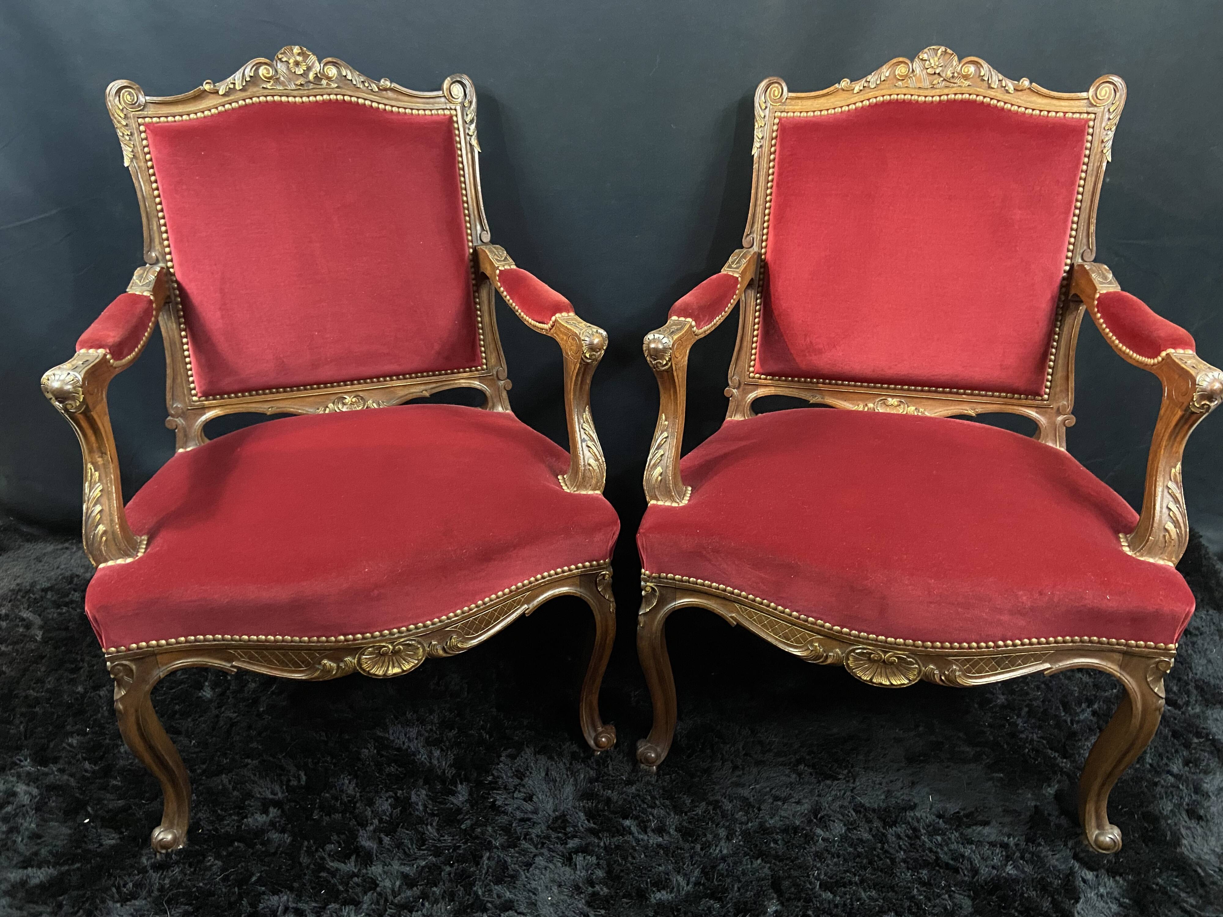 Pair of flat-back armchairs in Louis XV style in red velvet.