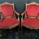 Pair of flat-back armchairs in Louis XV style in red velvet.