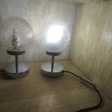 Duo of lamps in textured globe with a great play of light.