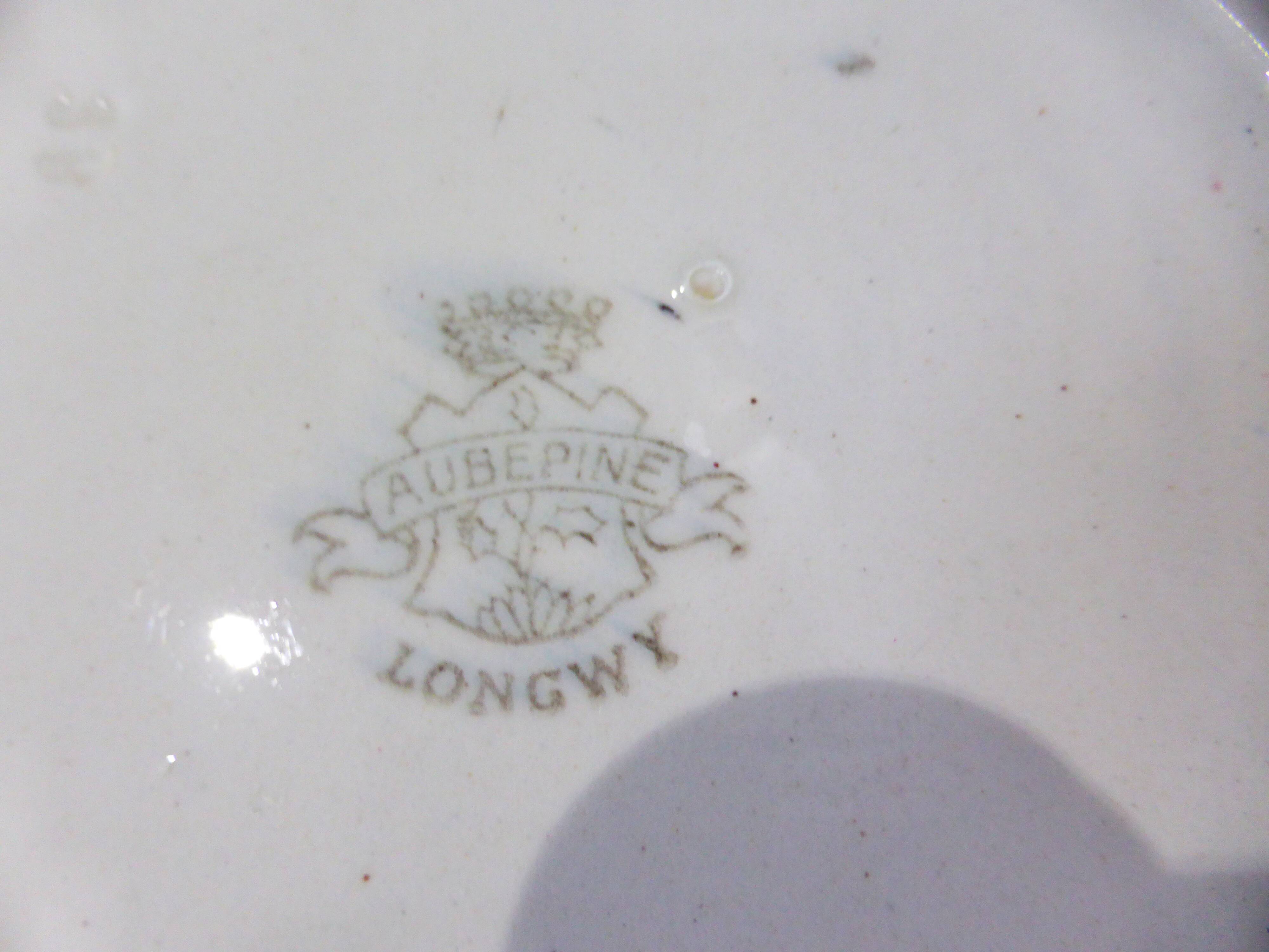 Hollow round dish from Longwy, Aubépine model