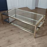 Vintage coffee table with glass, mirror, and brass.