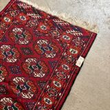 Bukhara rug with 12 panels in wool and burgundy silk, 88 x 54 cm.