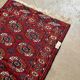 Bukhara rug with 12 panels in wool and burgundy silk, 88 x 54 cm.