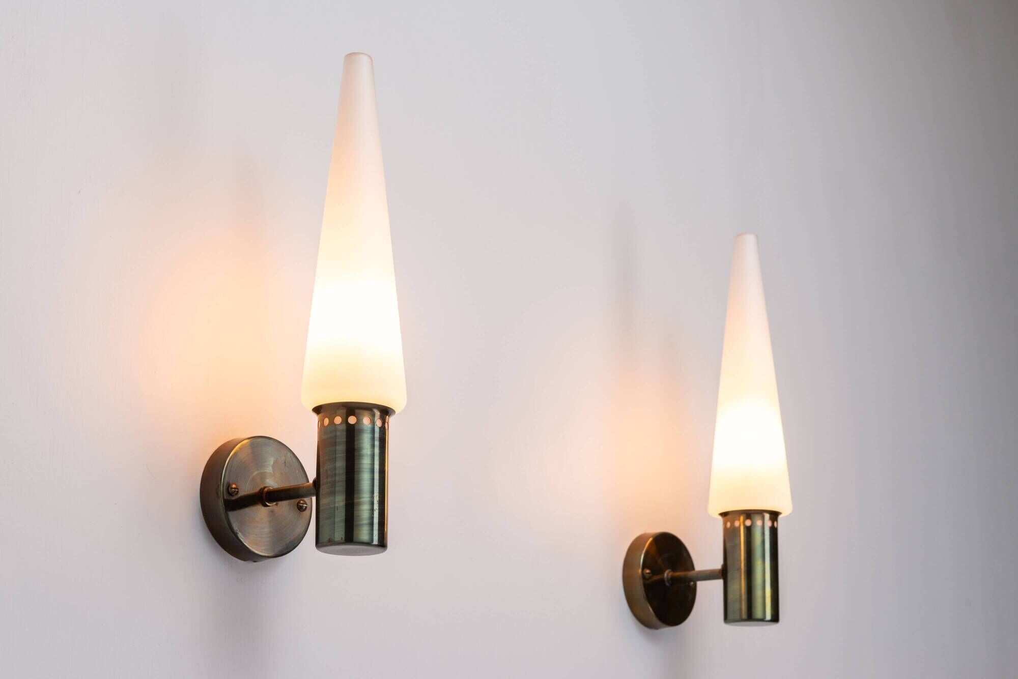 Set of two Hans Agne Jakobsson wall lamps with opal glass shades
