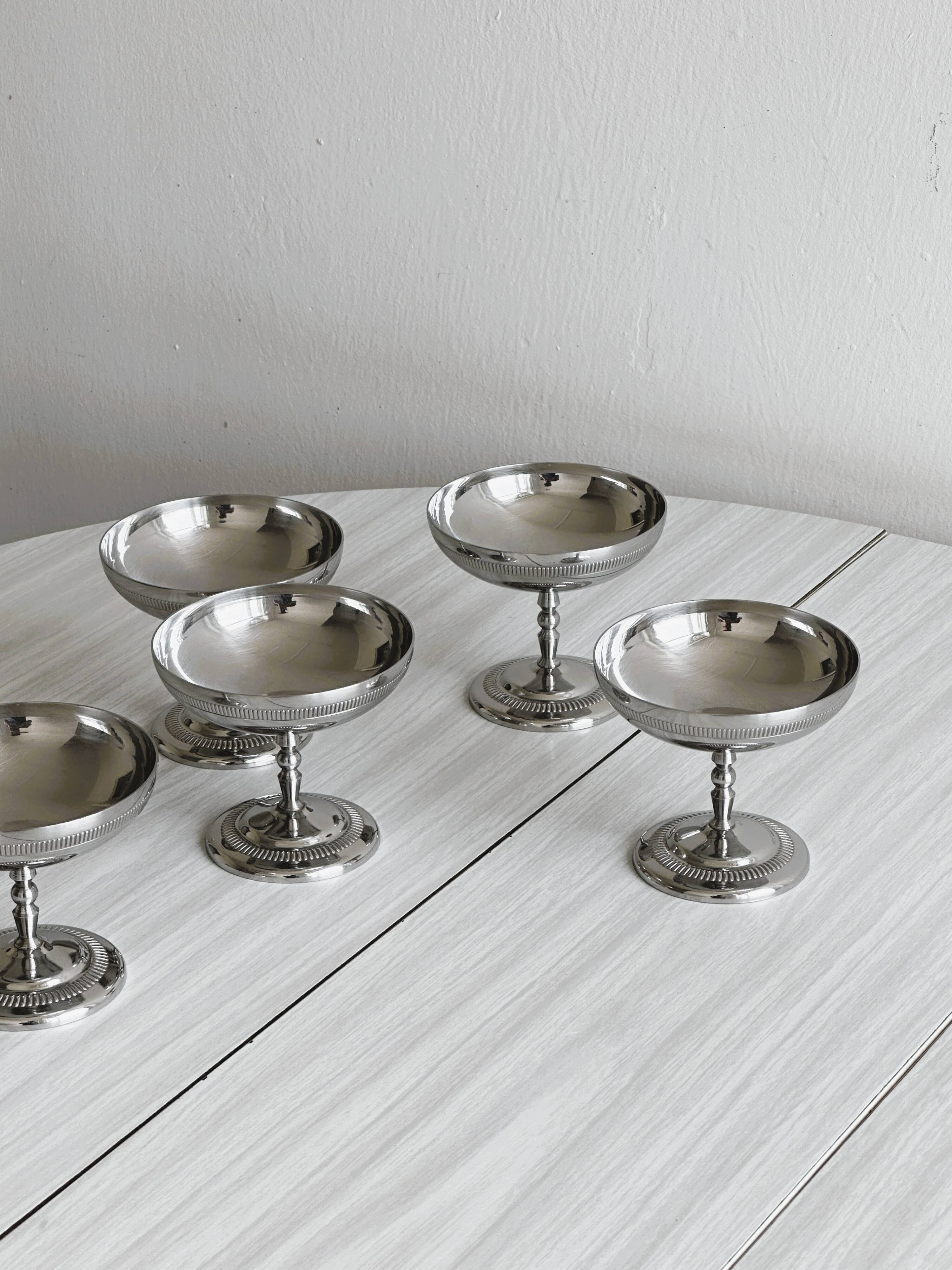 5 silver-plated metal cups