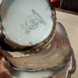 Breakfast set with tea or coffee in porcelain.