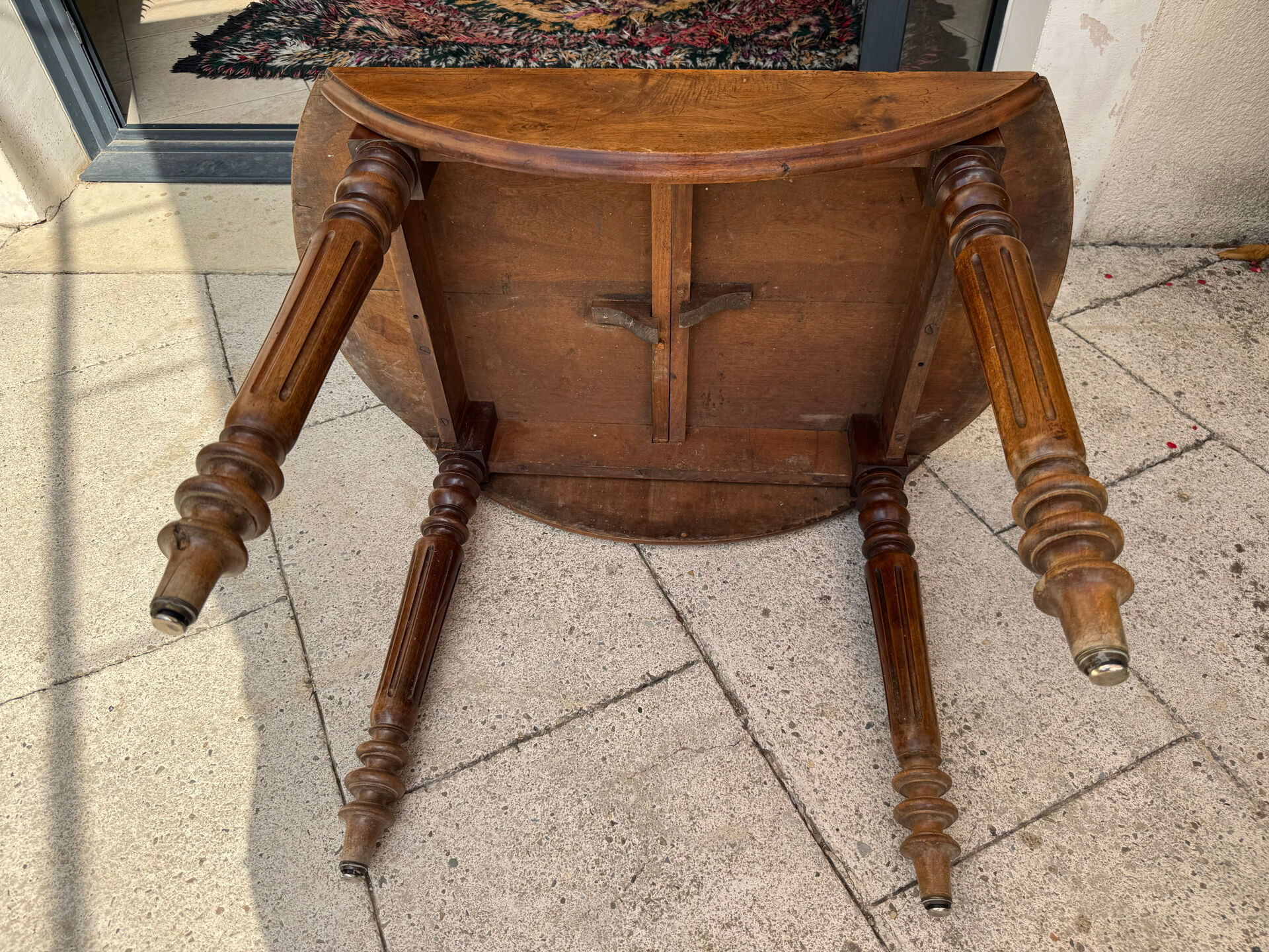 Farm table, two drop-leaves, 19th century, solid walnut.