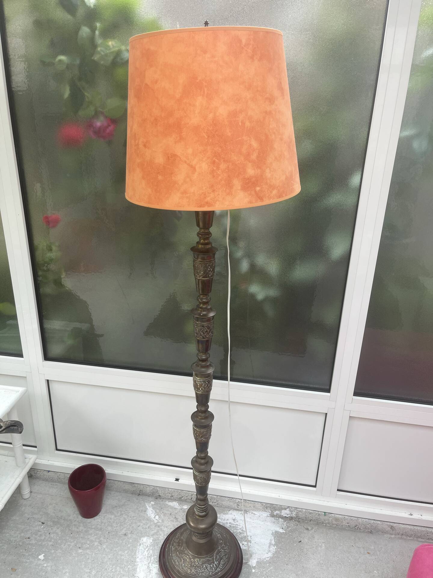 Brass floor lamp with an Orientalist wooden base.