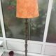 Brass floor lamp with an Orientalist wooden base.
