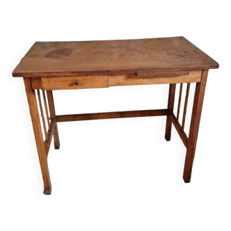 Old wooden desk with bars