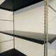 Vintage adjustable “string” shelf in metal and brass, Circa 60's