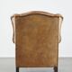 Sheep leather wingback chair with patina