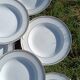 Twelve white porcelain plates