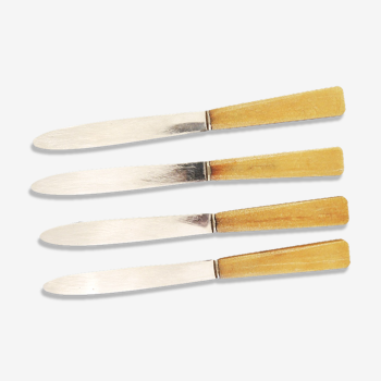 Set de 4 anciens couteaux de table inox et bakelite