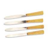 Set de 4 anciens couteaux de table inox et bakelite