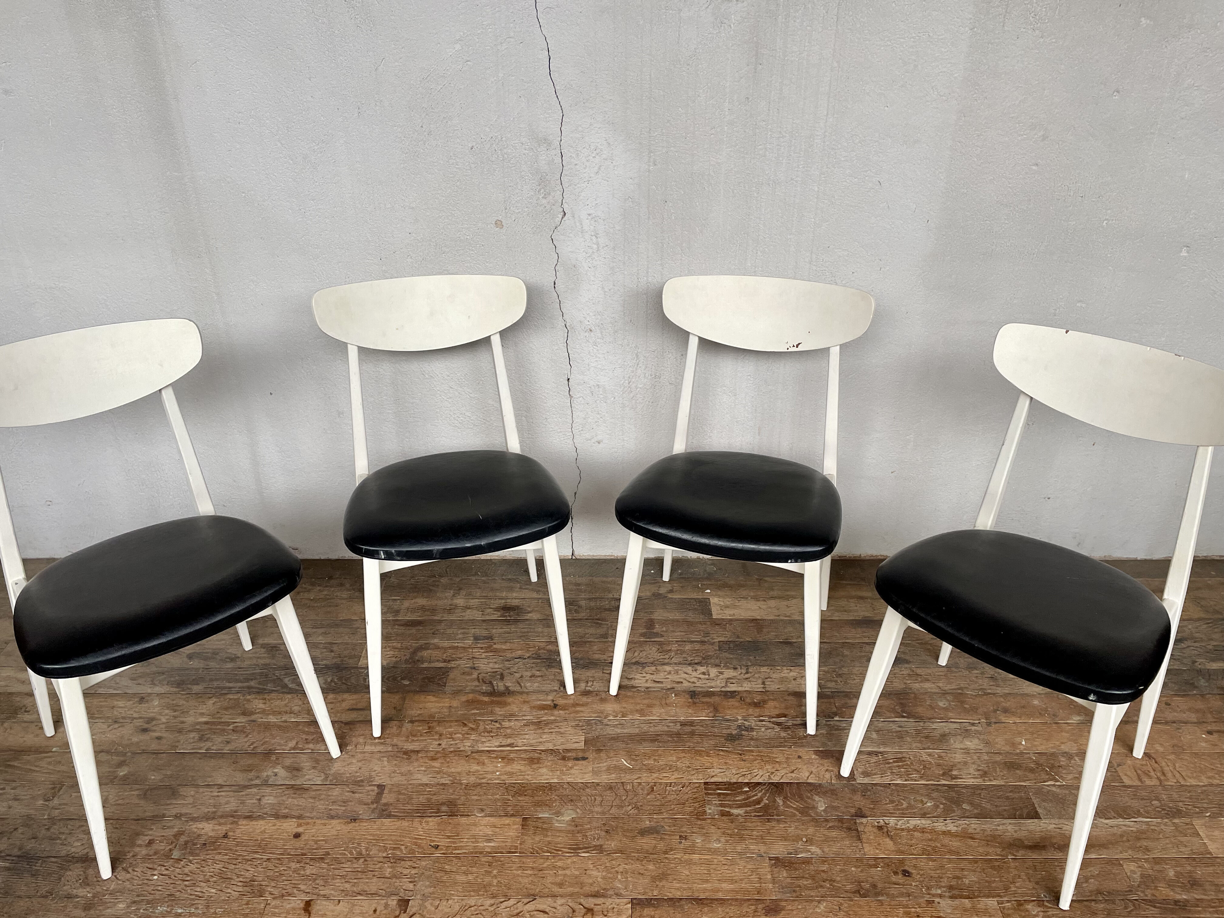 Series of 4 white and black Scandinavian chairs Ingrid from Stella 1960.