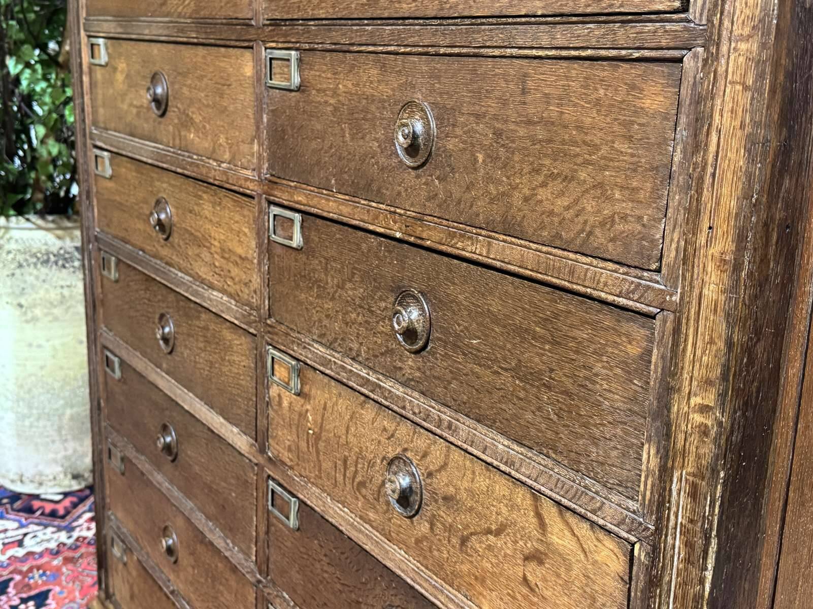 Notary's cabinet with 18 drawers in oak and fir from the early 20th century.