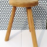 Crude wooden tripod stool