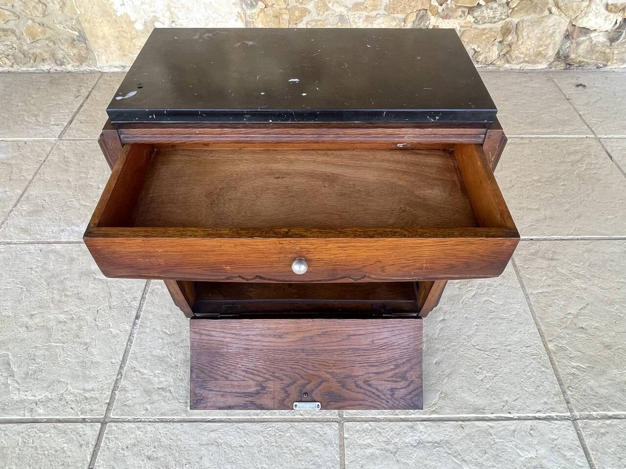Art Deco bedside table in walnut, black marble top, circa 1920.