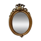Miroir ovale en bois et stuc doré 19ème