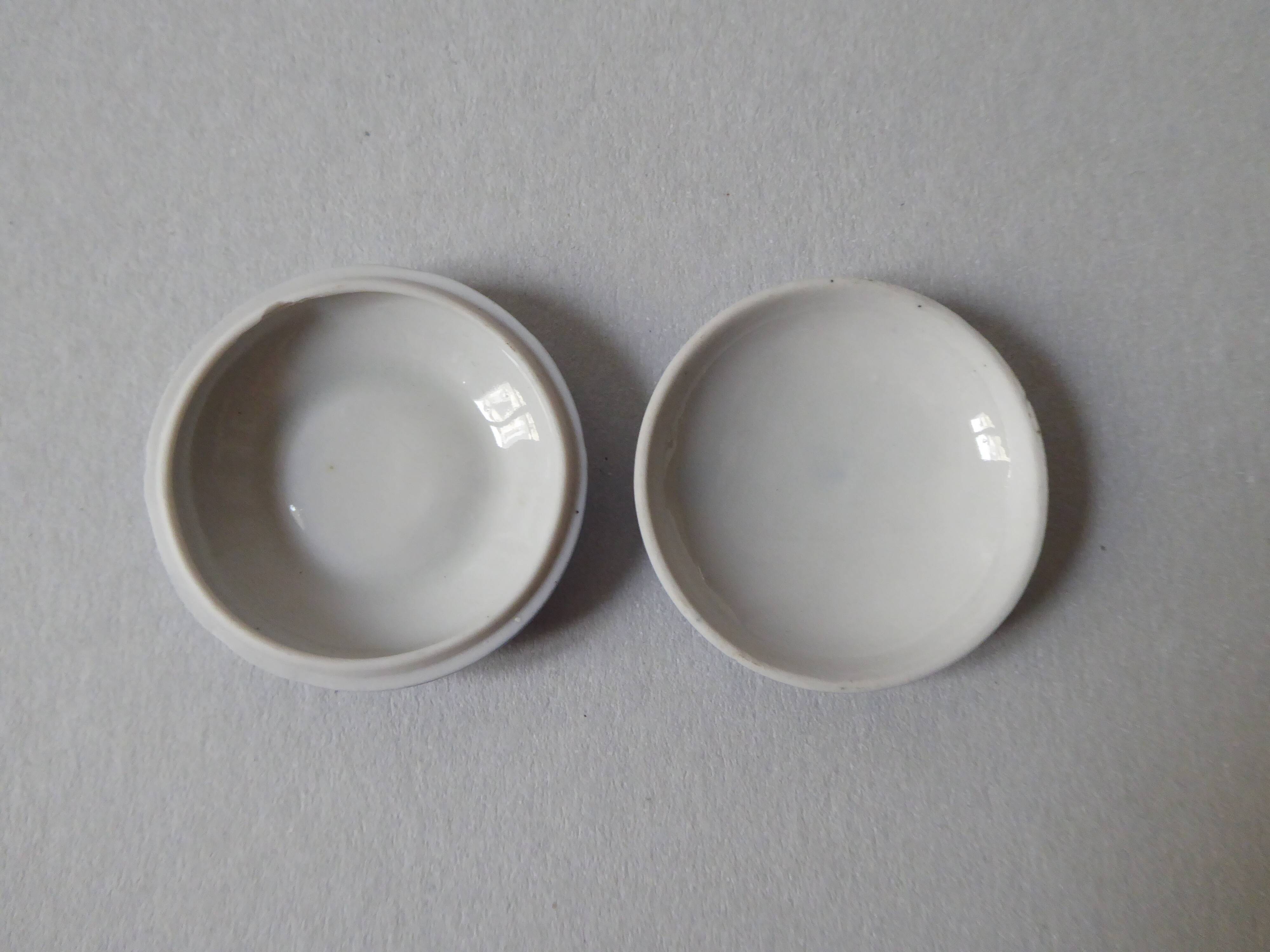 Porcelain pill box decorated with blue and white flowers