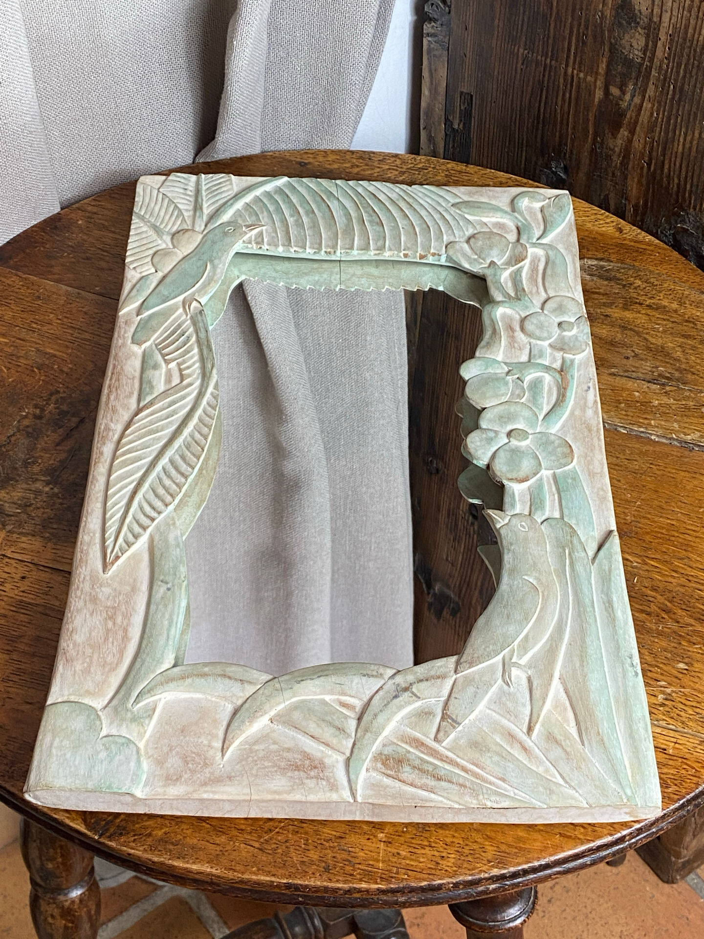 Carved wooden mirror