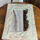 Carved wooden mirror