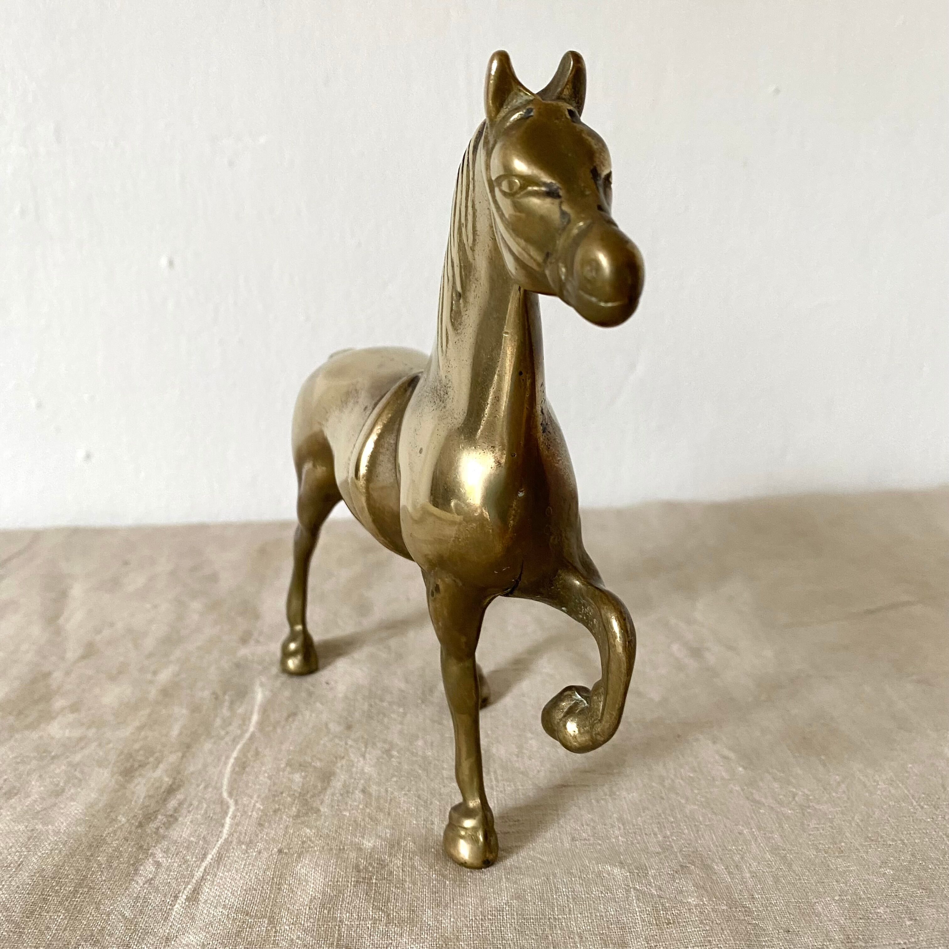 Cheval en laiton doré