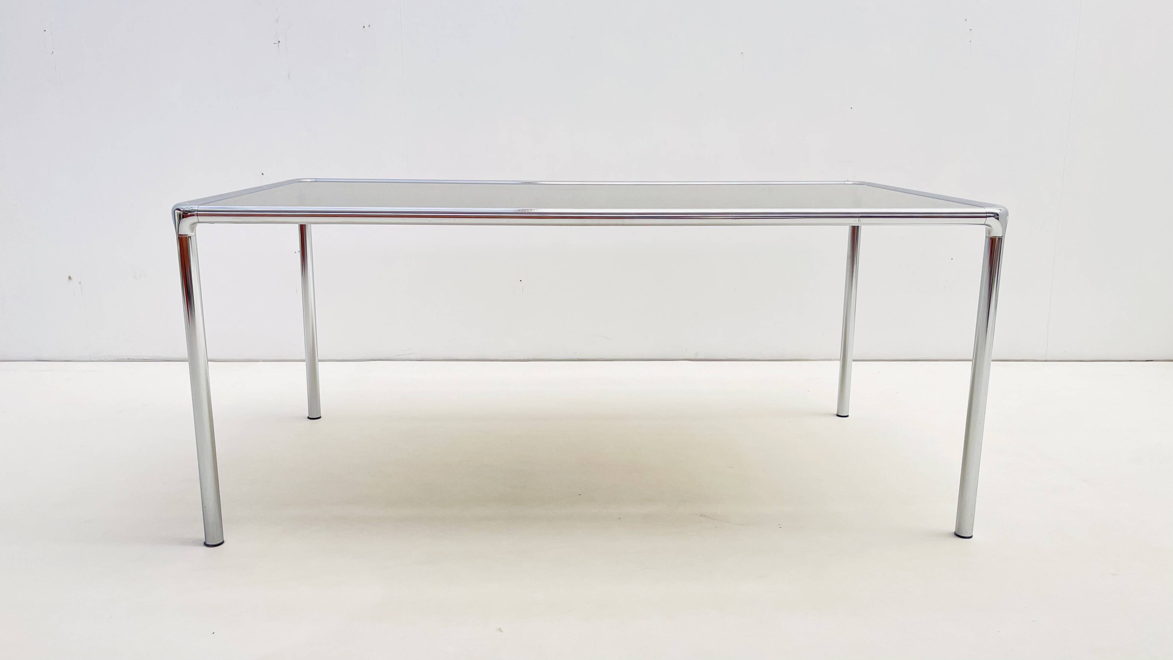 Etienne Fermigier - Dinning table in chrome and smoked glass