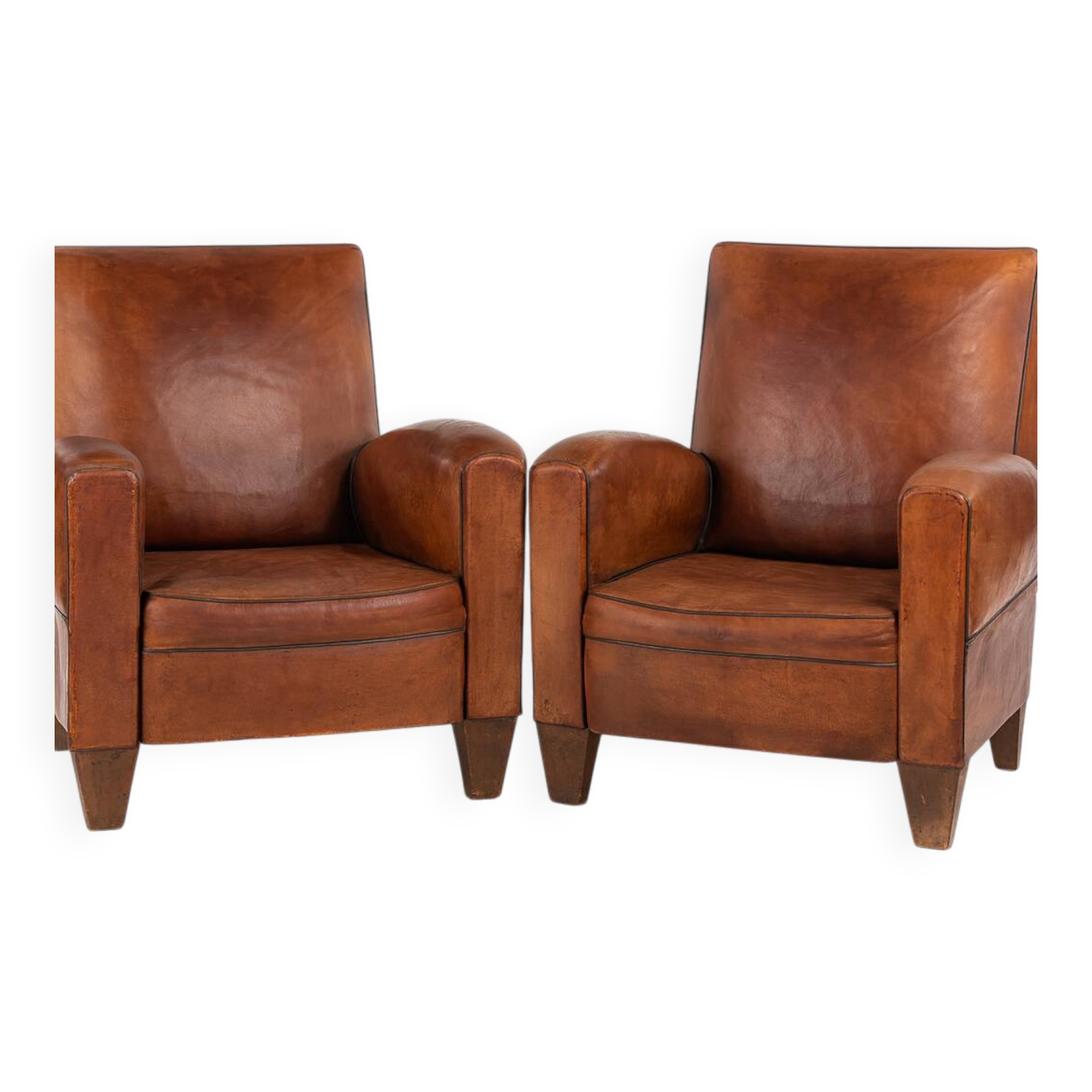 Paire de fauteuils club en cuir patiné – années 1940/50