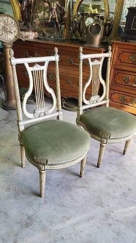 Pair of Louis XVI style chairs from the 18th century with lyre back.