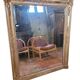 Antique gilded mirror from the 19th century, mercury mirror.