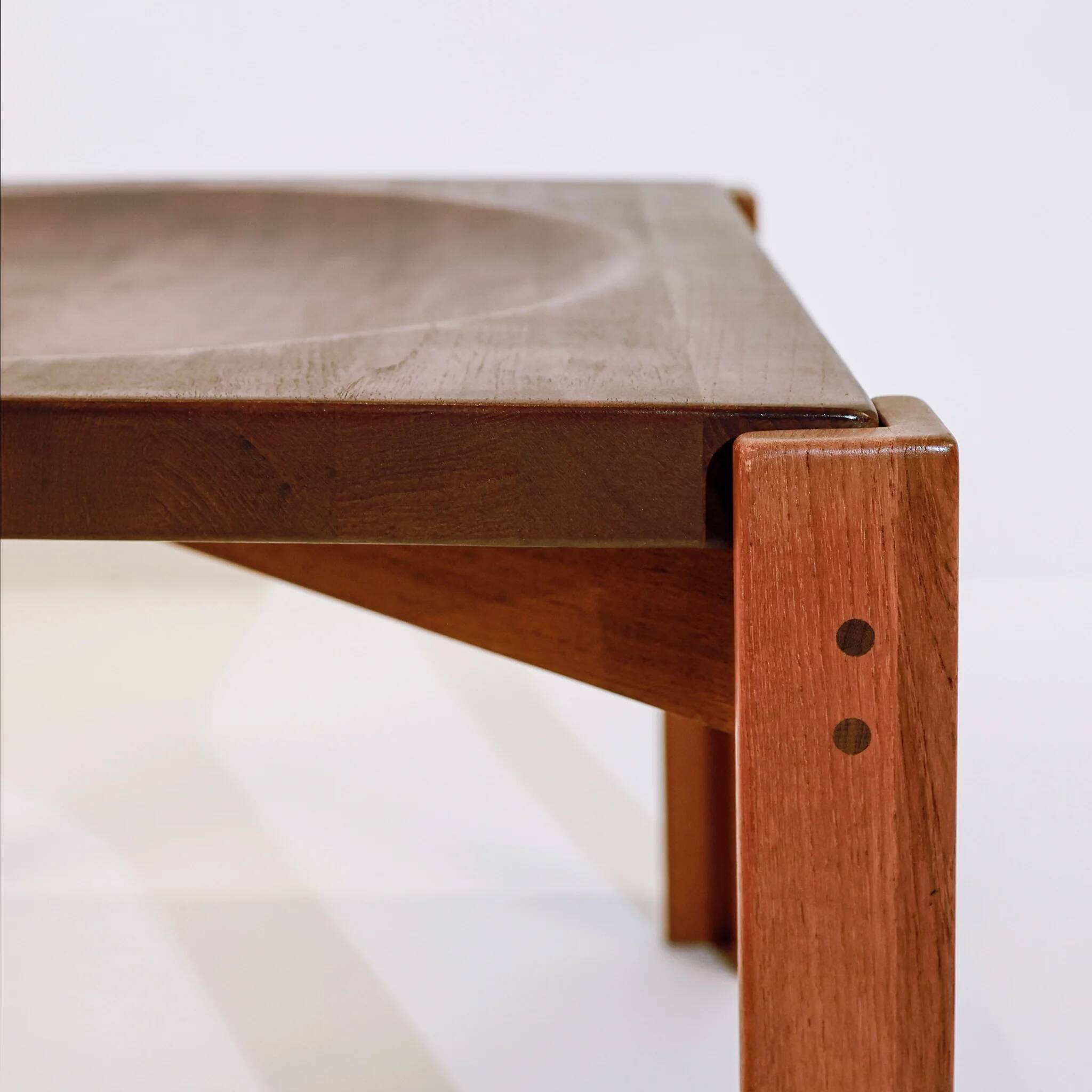 Vintage coffee table with a teak top by Jens Quistgaard, concave top, Denmark, 1960s.