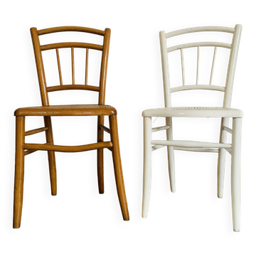 Pair of mismatched caned chairs