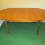 Teak dining table, an extension